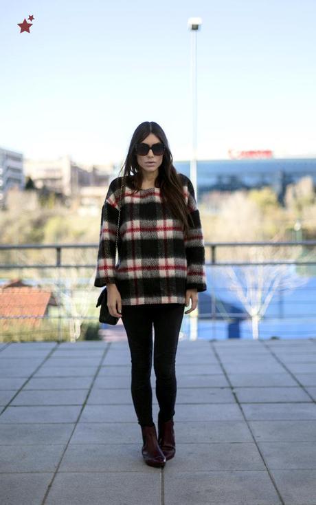 red, black and white checked sweater
