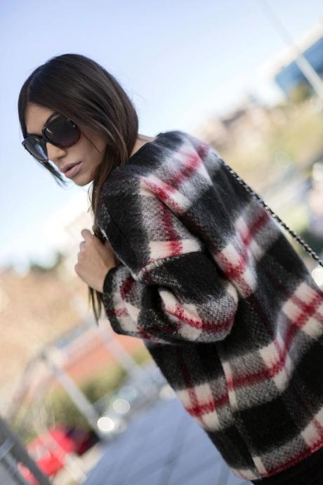 red, black and white checked sweater