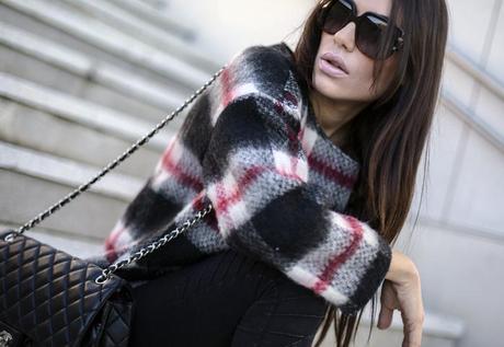 red, black and white checked sweater