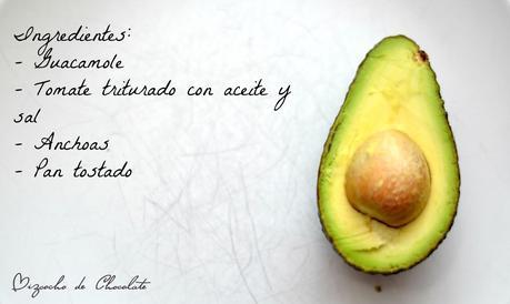 Tosta de guacamole, tomate y anchoas.