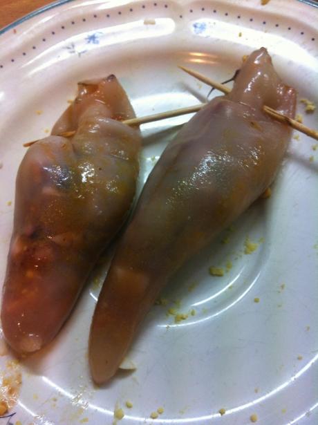 Chipirones Rellenos Con Salsa De Cebolla Morada