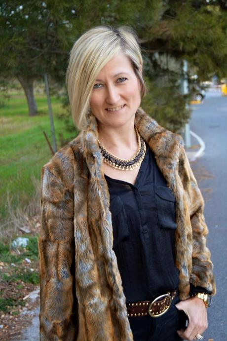 Total black and fur coat.