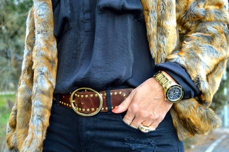 Total black and fur coat.