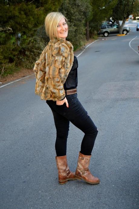 Total black and fur coat.