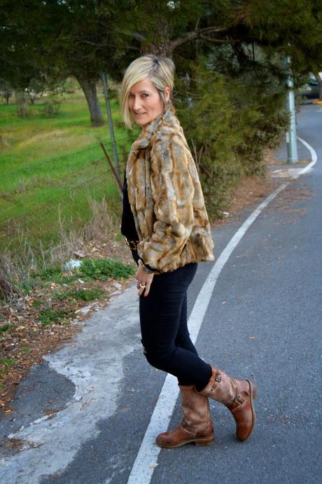 Total black and fur coat.