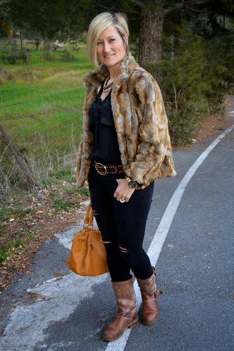 Total black and fur coat.