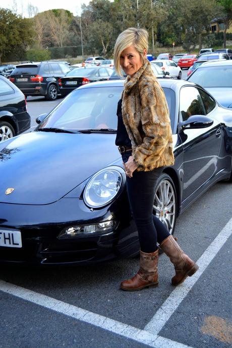 Total black and fur coat.