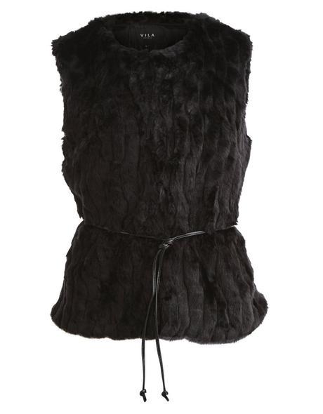 Como combinar chaleco de pelo negro Como combinar chaleco de pelo negro