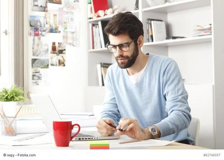 Portrait of young modern businessman