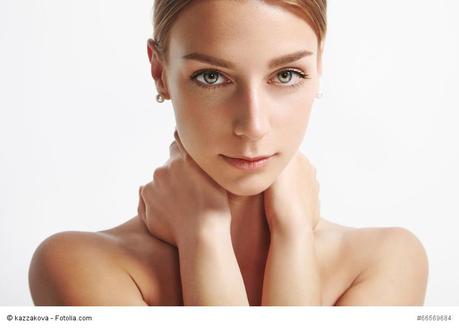 woman with ideal skin looking at camera