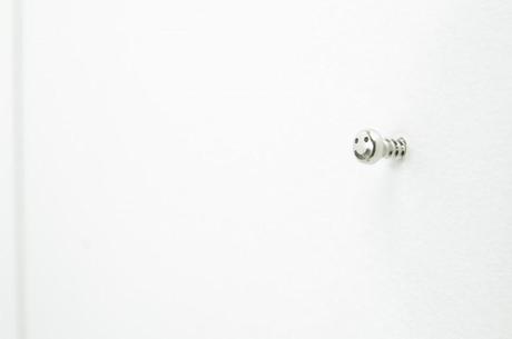 Original diseño de un tirafondo sonriente