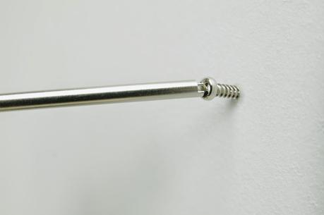 Original diseño de un tirafondo sonriente