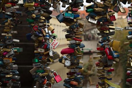 Love locks on a small bridge near the Lennon Wall in Prague, Czech Republic