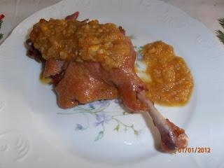 Confit de pato con salsa de naranja