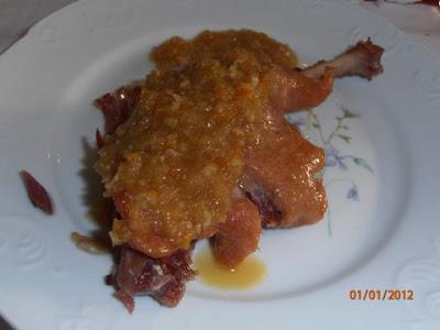 Confit de pato con salsa de naranja