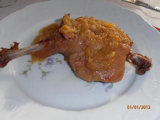 Confit de pato con salsa de naranja