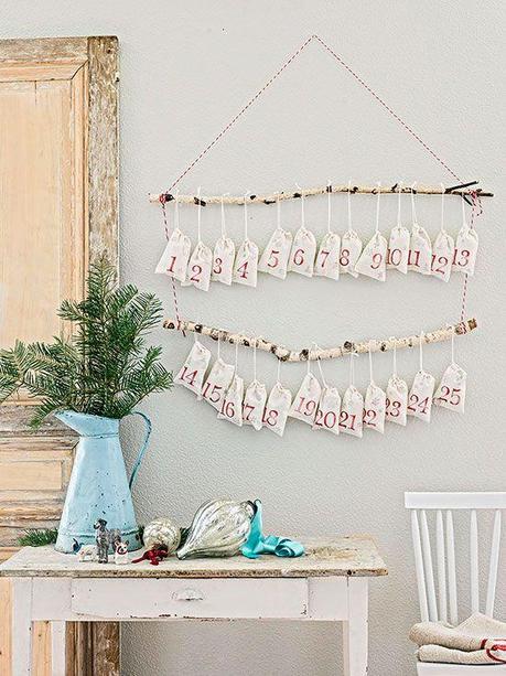 Hanging Countdown Christmas Calendar made from a birch branch and muslin bags - Better Homes & Gardens