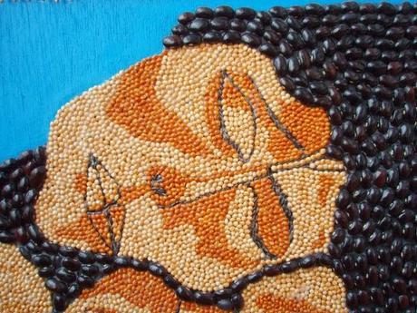 Cuadro de Guayasamin hecho con semillas pegadas una a una