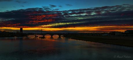 Ocaso sobre el rio Guadiana y Puentes