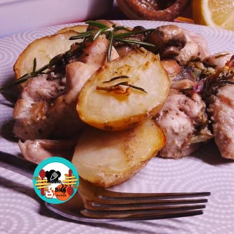 Conejo asado con patatas y champiñones