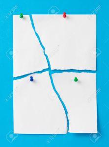 12674422-A4-size-sheet-of-paper-torn-into-four-parts-There-is-place-for-text--Stock-Photo