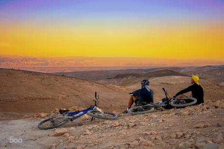 Cyclists take a moment to rest before the last leg of a 100 mile ride.