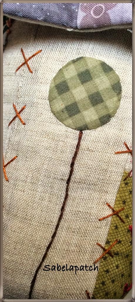 Casita sujeta-puertas, alfiletero