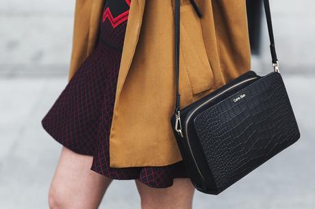 Camel_Jacket-Revolve_Clothing_Skirt-Red_Black_Skirt-Outfit-Street_Style-Balenciaga_Boots-Calvin_Klein_Bag-So_Real_Dior_Sunglasses-35