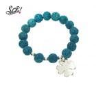 pulsera-rocas-volcanicas-azul-trebol-acero