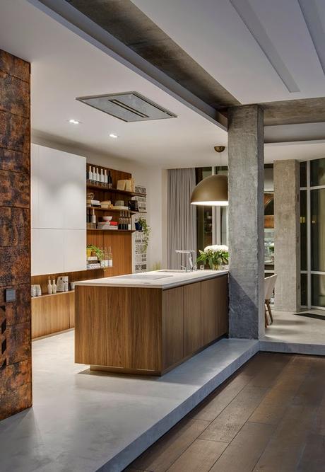 Juego de volúmenes de hormigón en un loft rehabilitado