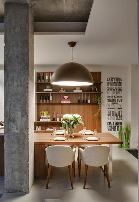 Juego de volúmenes de hormigón en un loft rehabilitado