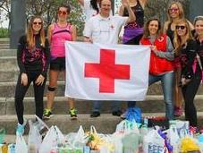 Guerreras Running Solidaridad mano
