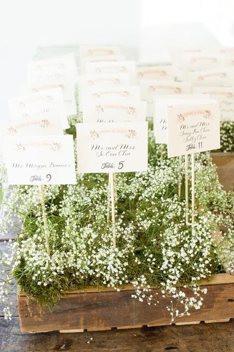 Casual Elegance | Escort Card Display -- In Baby's Breath -- See the wedding on SMP: http://www.StyleMePretty.com/2013/09/19/hudson-valley-wedding-from-style-art-life-photography/ Style.Art.Life Photography