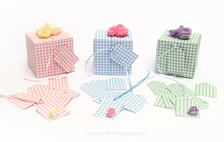 Celebrando con creatividad! Los mil usos de los Papeles Digitales. Mira que lindas cajitas puedes lograr con un simple papel con diseño cuadrille y agregando un toque con las flores de papel.