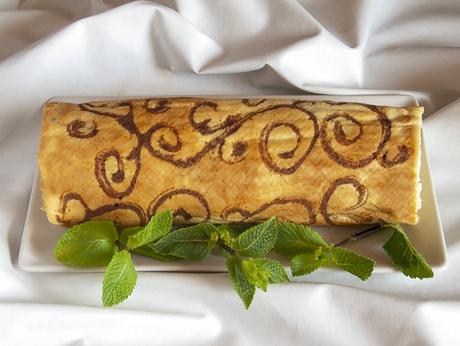 Brazo de gitano de queso, limón y menta