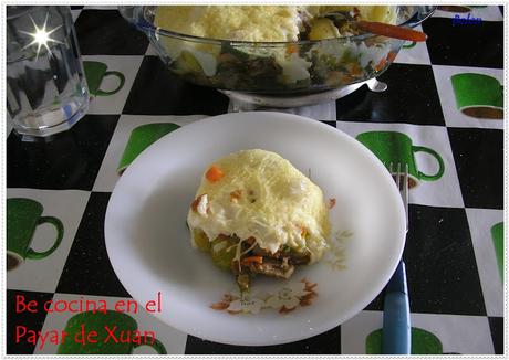 Menestra con carne gratinada