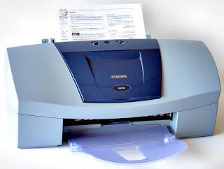 «Canon S520 ink jet printer» de André Karwath aka Aka - Trabajo propio. Disponible bajo la licencia CC BY-SA 2.5 vía Wikimedia Commons - https://commons.wikimedia.org/wiki/File:Canon_S520_ink_jet_printer.jpg#/media/File:Canon_S520_ink_jet_printer.jpg