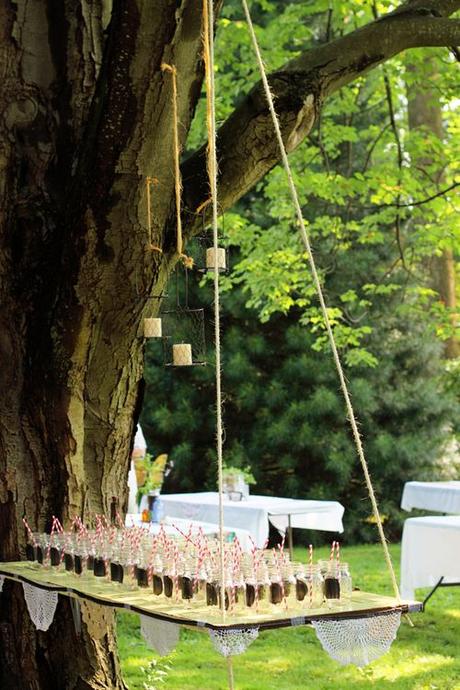 Suspend tables from the trees with rope. | 32 Totally Ingenious Ideas For An Outdoor Wedding