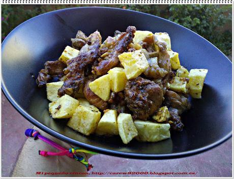 Conejo al ajillo con patatas fritas