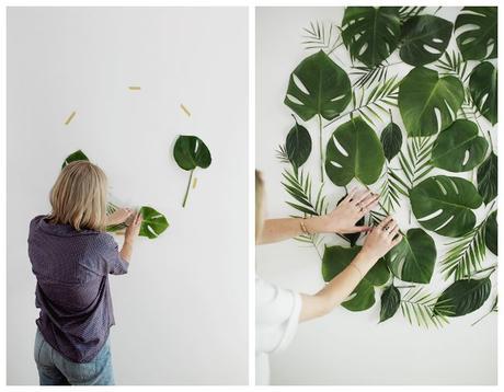Hojas y flores decorando la pared