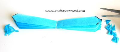 Cómo hacer pompones de papel para decoración