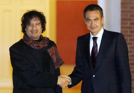 Libyan leader Gaddafi shakes hands with Spain's PM Zapatero in Madrid