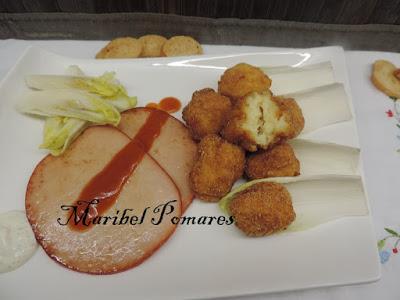 Lomos de pechuga de pavo con bolitas de patata.