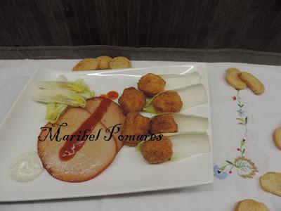 Lomos de pechuga de pavo con bolitas de patata.