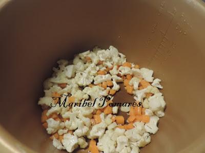 Garbanzos con coliflor, zanahoria, calabaza y huevo.