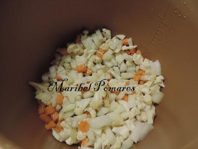 Garbanzos con coliflor, zanahoria, calabaza y huevo.