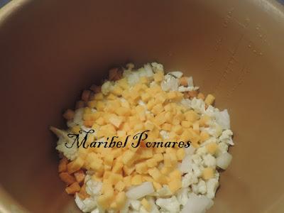 Garbanzos con coliflor, zanahoria, calabaza y huevo.