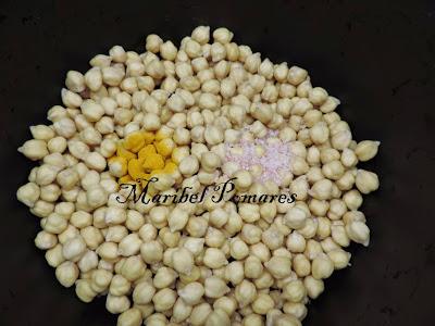 Garbanzos con coliflor, zanahoria, calabaza y huevo.