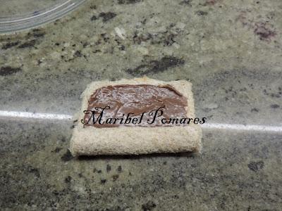 Flamenquines de pan de molde con nutella o también llamado pan francés.