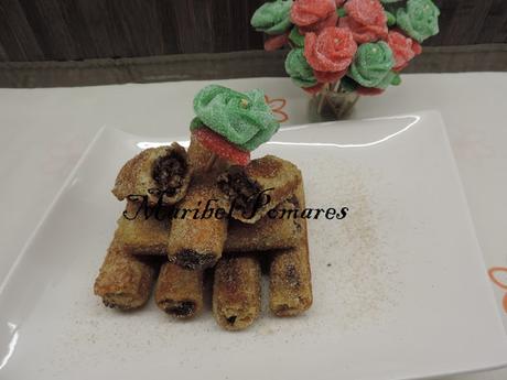 Flamenquines de pan de molde con nutella o también llamado pan francés.